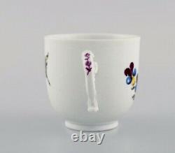 Antique Meissen coffee cup with saucer in hand-painted porcelain