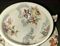 Antique Sarreguemines Lavalliere floral faience cup & saucer set, France