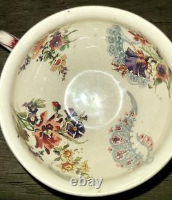 Antique Sarreguemines Lavalliere floral faience cup & saucer set, France