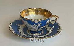 Antique meissen blue and white with gold floral teacup and saucer 1925