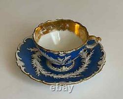 Antique meissen blue and white with gold floral teacup and saucer 1925