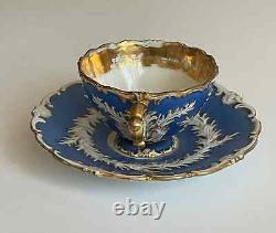 Antique meissen blue and white with gold floral teacup and saucer 1925