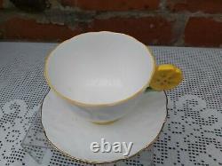 Aynsley flower handle cup and mismatch saucer