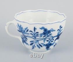Meissen, Germany. Four Blue Onion coffee cups with saucers in porcelain