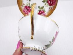 Paragon Floating Roses Gilded Tea Cup and saucer