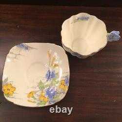 Rare Paragon Flowered-Handle Cup and Saucer