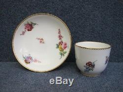 SEVRES PORCELAIN CUP & SAUCER with flowers decorated and gilt border 18th cent