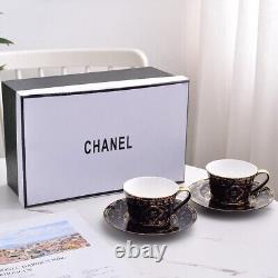 Set of 2 Chanel Black Porcelain Cups and Saucers Gold Accent Luxury Design