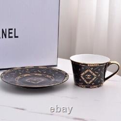 Set of 2 Chanel Black Porcelain Cups and Saucers Gold Accent Luxury Design