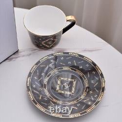 Set of 2 Chanel Black Porcelain Cups and Saucers Gold Accent Luxury Design