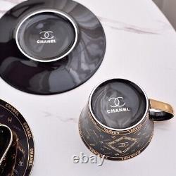 Set of 2 Chanel Black Porcelain Cups and Saucers Gold Accent Luxury Design