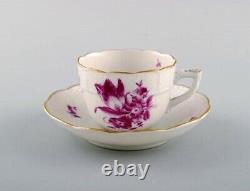 Two Herend coffee cups with saucers in hand painted porcelain. Purple flowers